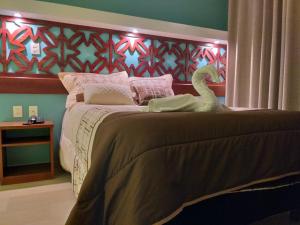 Postel nebo postele na pokoji v ubytování 9 Estrellas Casa Hotel