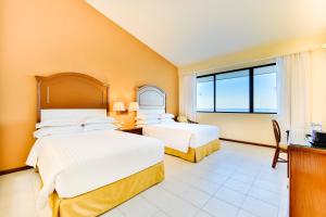 Voodi või voodid majutusasutuse Occidental Tucancún - All Inclusive toas