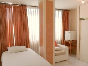 Voodi või voodid majutusasutuse HOTEL MAISON FIORI (Centro) toas
