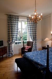 Ein Bett oder Betten in einem Zimmer der Unterkunft Chambres d'hôtes Les Pratges
