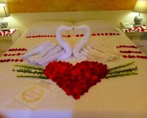 Voodi või voodid majutusasutuse HOTEL MAISON FIORI (Centro) toas
