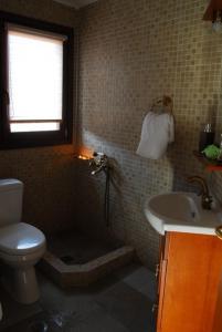 Ένα μπάνιο στο Ξενώνας Το Πέτρινο