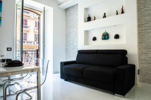 A seating area at Rettifilo 201 Exclusive Rooms