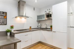 Kuchyň nebo kuchyňský kout v ubytování Apartment Malaga Center