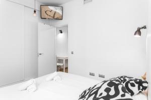 Postel nebo postele na pokoji v ubytování Apartment Malaga Center
