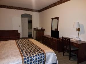 Postel nebo postele na pokoji v ubytování Texas Inn Downtown McAllen