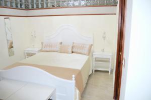 Posteľ alebo postele v izbe v ubytovaní B&B Punto Stella