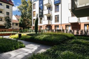 Vonkajšia záhrada v ubytovaní Harmonica Apartment - LoftAffair
