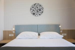 Hotel Osmine客房内的一张或多张床位