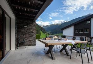 Photo de la galerie de l'établissement Haus 4 Montafon by Pferd auf Wolke, à Gaschurn