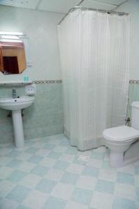 Koupelna v ubytování Al BARAKAH HOTEL