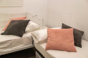 A bed or beds in a room at CASA LO PASTELER