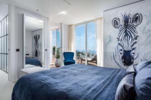 Кровать или кровати в номере Avitan Premium & Luxury Villas