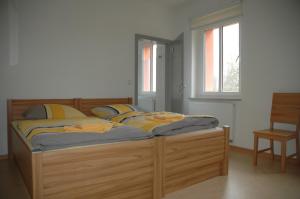 Ein Bett oder Betten in einem Zimmer der Unterkunft Sport Tourist Hostel Weißenfels