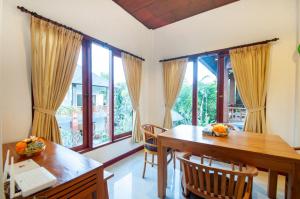 Posezení v ubytování Flamboyant Villa Ubud