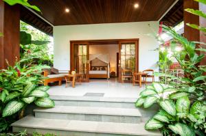 Zahrada ubytování Flamboyant Villa Ubud