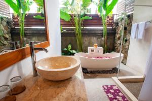 Koupelna v ubytování Flamboyant Villa Ubud
