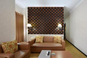 Posezení v ubytování Puri Saron Denpasar Hotel