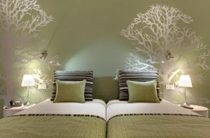 Cama ou camas em um quarto em Hotel Inglaterra - Charme & Boutique