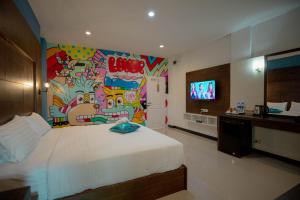 Postel nebo postele na pokoji v ubytování Smart Hotel