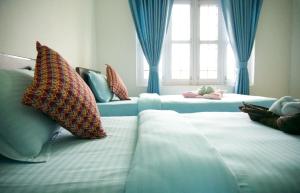 Katil atau katil-katil dalam bilik di Hope Guest House