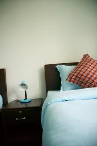 Katil atau katil-katil dalam bilik di Hope Guest House