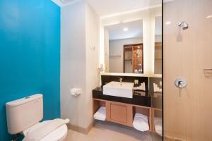 Koupelna v ubytování Nava Hotel Tawangmangu