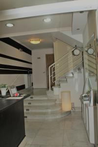 a hallway with a staircase in a building at Hotel Fuente La Plata in Oviedo