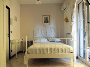 A bed or beds in a room at Villa Franca B&B