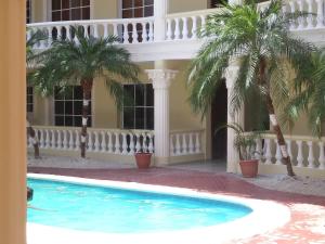 Bazén v ubytování Room with fan use Bavaro Punta Cana nebo v jeho okolí