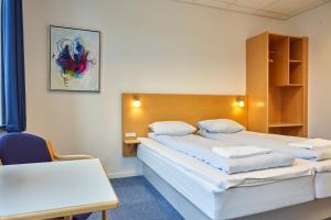 Postel nebo postele na pokoji v ubytování BB-Hotel Vejle Park