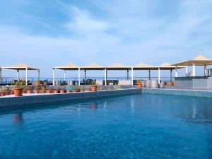 Πισίνα στο ή κοντά στο Golden Tulip Muscat