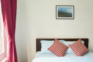 Katil atau katil-katil dalam bilik di Hope Guest House