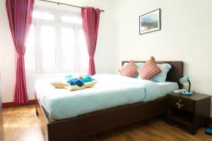 Katil atau katil-katil dalam bilik di Hope Guest House