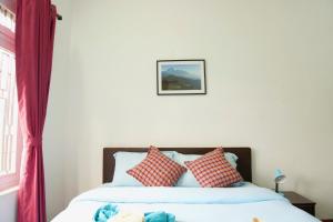 Katil atau katil-katil dalam bilik di Hope Guest House