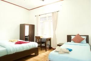 Katil atau katil-katil dalam bilik di Hope Guest House