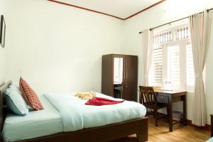 Katil atau katil-katil dalam bilik di Hope Guest House