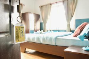 Katil atau katil-katil dalam bilik di Hope Guest House