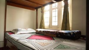 Katil atau katil-katil dalam bilik di Hope Guest House