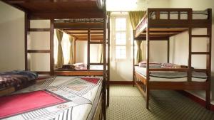 Katil atau katil-katil dalam bilik di Hope Guest House