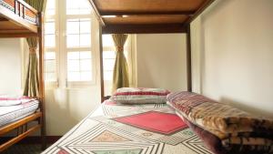 Katil atau katil-katil dalam bilik di Hope Guest House