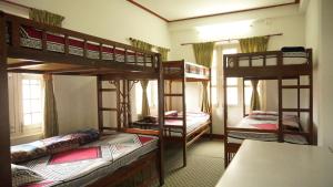 Ένα ή περισσότερα κρεβάτια σε δωμάτιο στο Hope Guest House