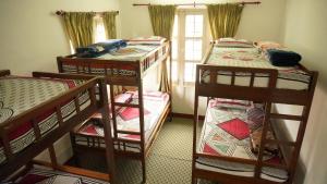 Katil atau katil-katil dalam bilik di Hope Guest House
