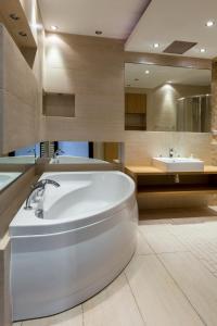 Ванна кімната в Szewska 7 Apartments