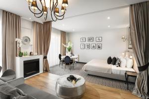 Posteľ alebo postele v izbe v ubytovaní Hotel Atelia
