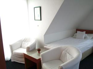 Postel nebo postele na pokoji v ubytování Haus Köbesine