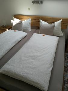 Postel nebo postele na pokoji v ubytování Appartements Apfelblüte