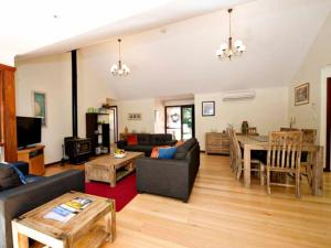 a living room with a couch and a table at Ashleigh - In Town - Margaret River in Margaret River Town