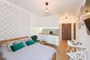 Kuchnia lub aneks kuchenny w obiekcie YOURAPART Chmielna Park