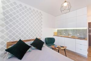 Kuchnia lub aneks kuchenny w obiekcie YOURAPART Chmielna Park